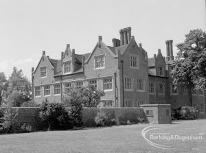 Eastbury House, Barking after restoration, showing the north-east corner of the House and retaining wall, looking from north-west, 1967