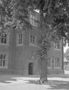 Eastbury House, Barking after restoration, showing the three-storey brick and stone porch with tree, 1967