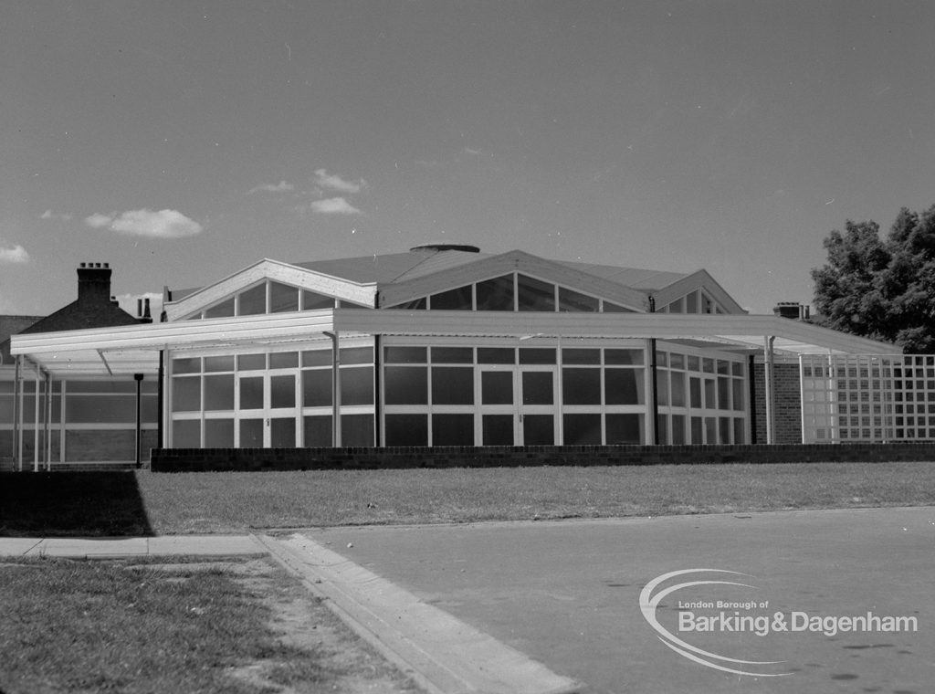 Faircross Special School, Barking, showing exterior view of the single-storey white-framed zig-zag swimming pool, 1967