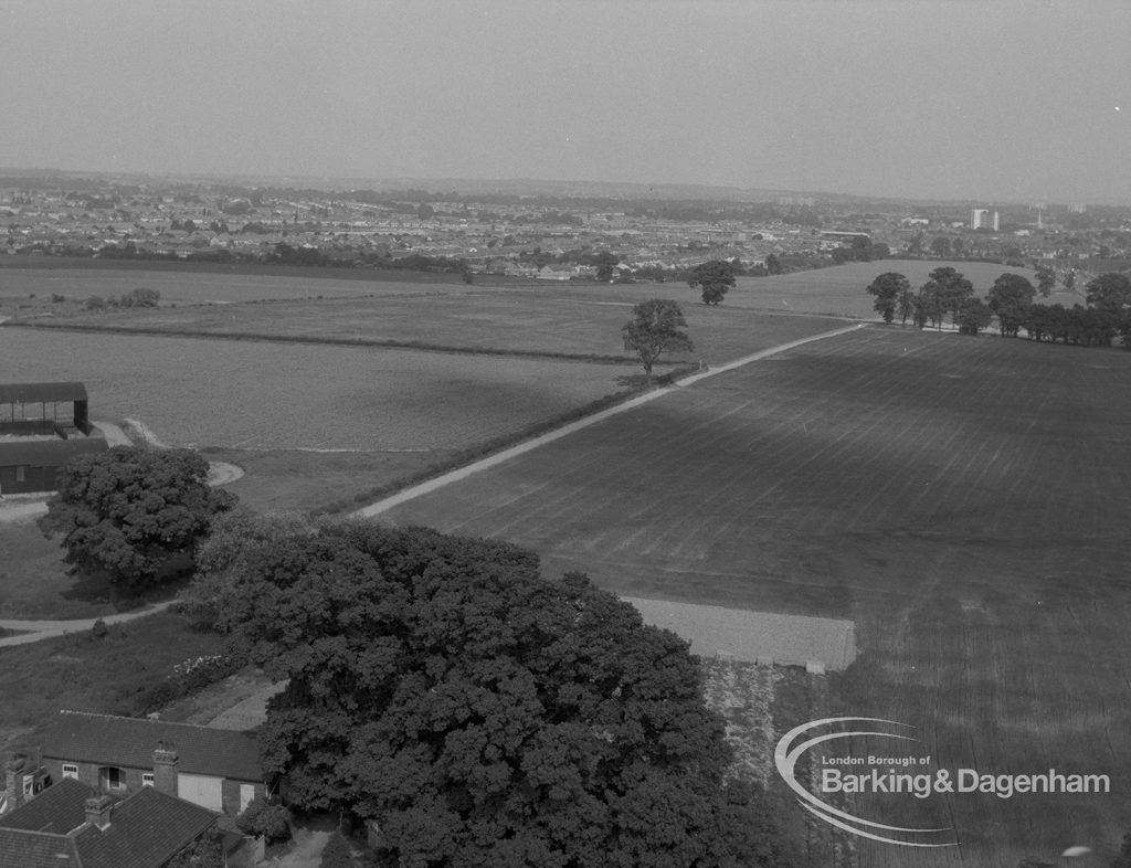 View from roof of Highview House, Hatch Grove, Chadwell Heath of cart-track footpath from Crown Farm towards rural Romford, 1967