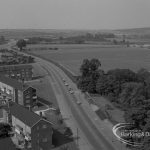 View from roof of Highview House, Hatch Grove, Chadwell Heath of Whalebone Lane North, with farm on right and Marks Gate housing on left, 1967
