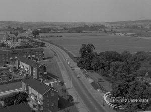 View from roof of Highview House, Hatch Grove, Chadwell Heath of Whalebone Lane North, with farm on right and Marks Gate housing on left, 1967