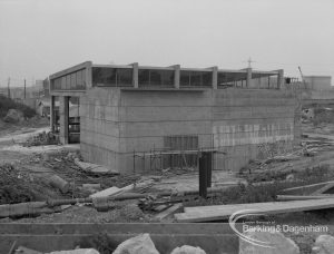 Sewage Works Reconstruction (Riverside Treatment Works) XVIII, showing blind-walled building with elevated tanks [partly seen in EES12191], 1967
