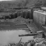 Sewage Works Reconstruction (Riverside Treatment Works) XVIII, showing outfall-banks exposed at low tide, with wall and apron facing south, 1967