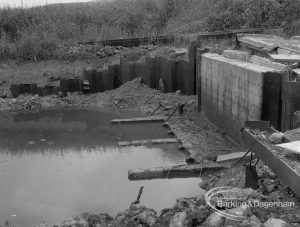 Sewage Works Reconstruction (Riverside Treatment Works) XVIII, showing outfall-banks exposed at low tide, with wall and apron facing south, 1967