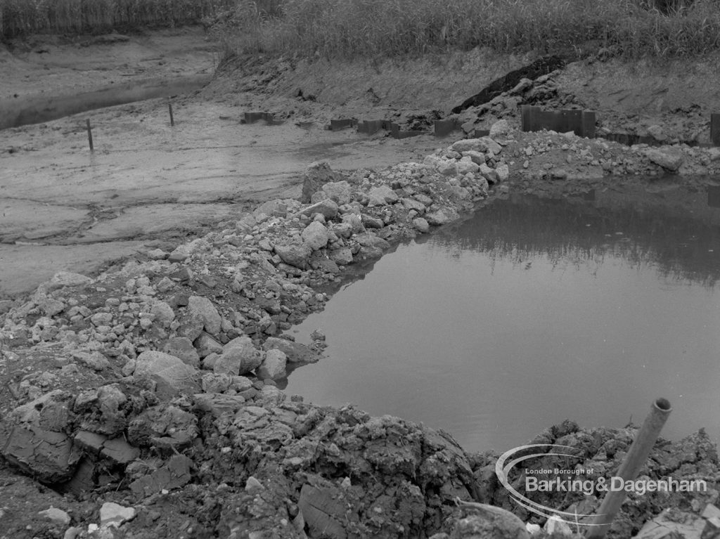 Sewage Works Reconstruction (Riverside Treatment Works) XVIII, showing outfall-banks exposed at low tide, with barrage of rubble against hole in fifteen foot pool, 1967