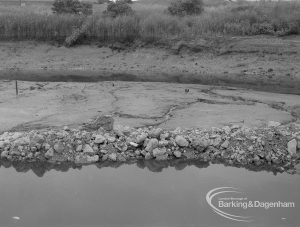 Sewage Works Reconstruction (Riverside Treatment Works) XVIII, showing outfall-banks exposed at low tide, with reeds, bank of creek, water, barrage and pool, 1967