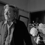 London Borough of Barking Libraries staff, showing retiring head janitor Mr Frank Walker with vase of roses he grew, 1967