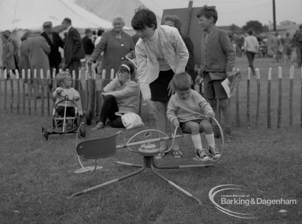 Dagenham Town Show 1967, showing supervised children with toys in children’s playground, 1967