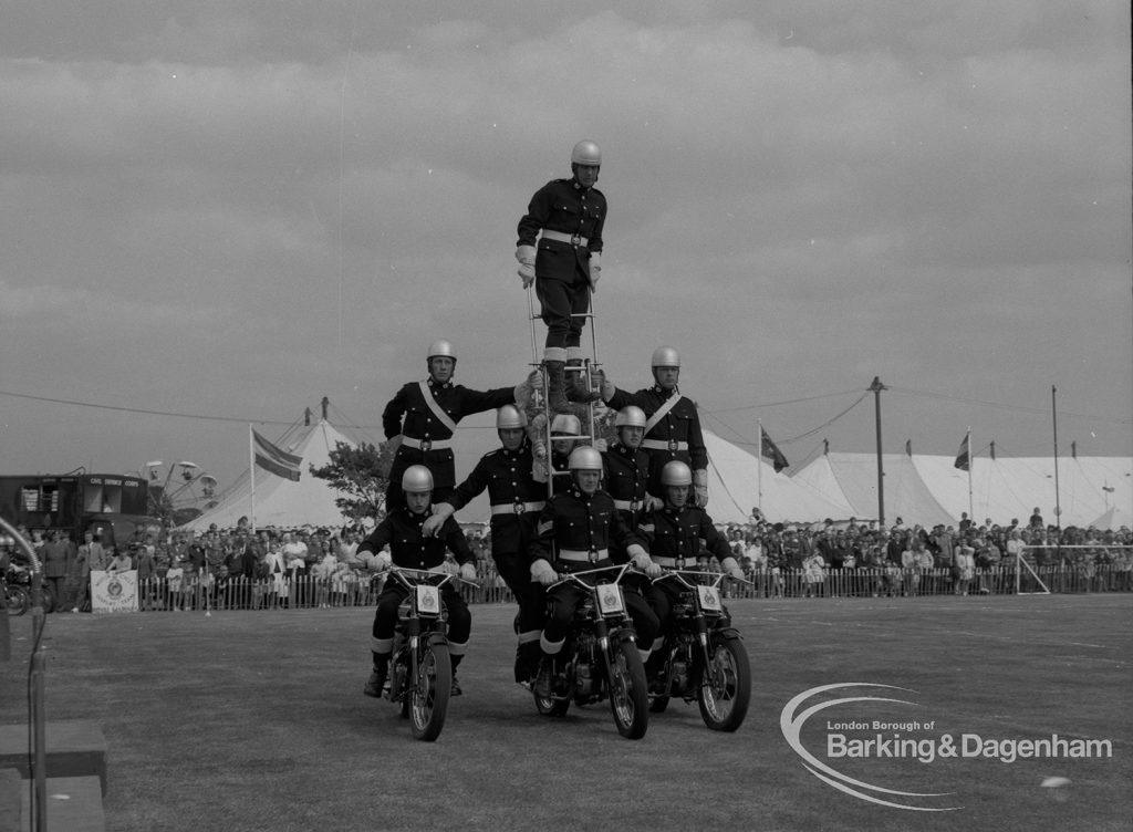 Dagenham Town Show 1967, showing Royal Marines Motorcycle Team Display, with group of marines on three motorbikes in arena, 1967