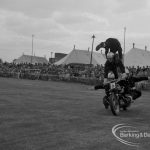 Dagenham Town Show 1967, showing Royal Marines Motorcycle Team Display, with group of marines balancing on motorbike in arena, 1967