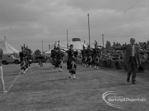 Dagenham Town Show 1967, showing bagpipers from Highland Pipe Band 57th (Middlesex) General Hospital RAMC marching in line in arena, 1967