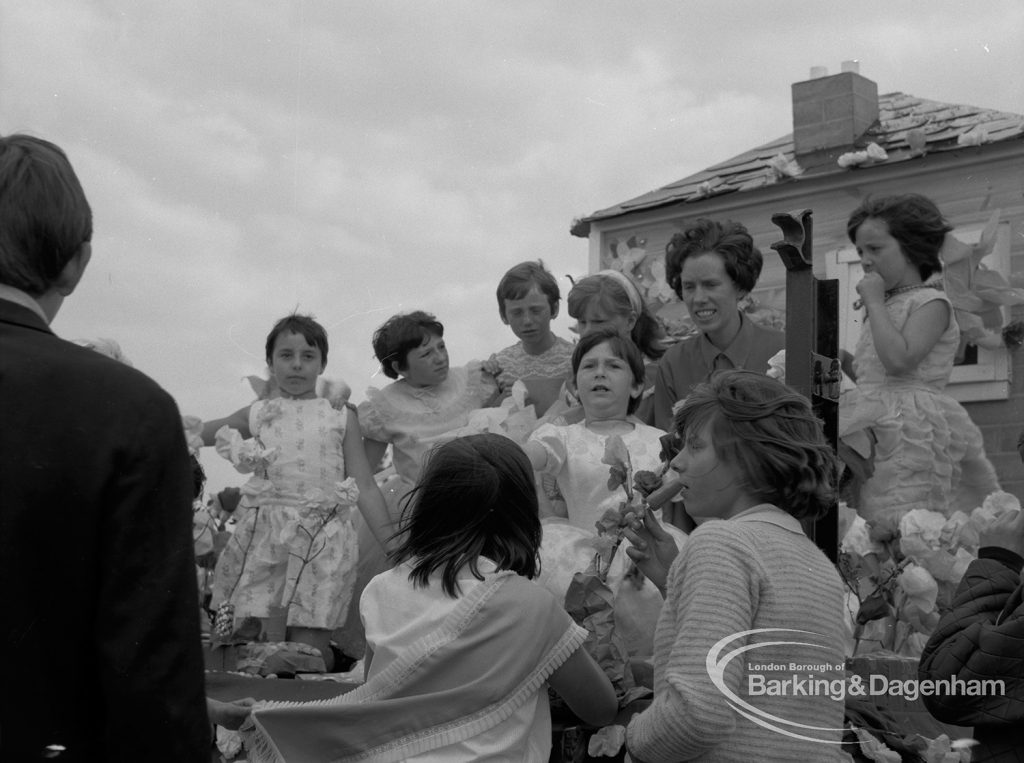 Dagenham Town Show 1967, showing a group of unidentified people on a flat, 1967