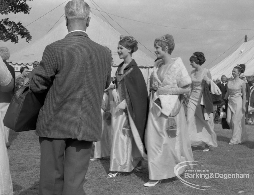 Dagenham Town Show 1967, showing beauty queens and attendants walking past and smiling, 1967