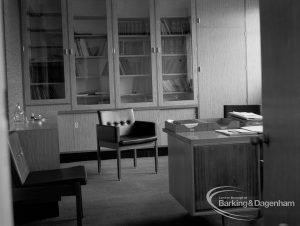 London Borough of Barking Town Clerk’s Office, showing desk and visitors’ chairs, looking towards bookcase, 1967