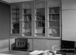 London Borough of Barking Town Clerk’s Office, showing top of desk, leather chair and glazed bookcases, 1967