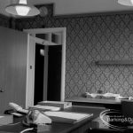 London Borough of Barking Town Clerk’s Office, showing entrance door, wallpaper, desk and table, 1967