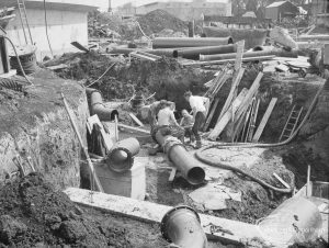 Sewage Works Reconstruction (Riverside Treatment Works) XIX, showing men working on underground main pipes, 1967