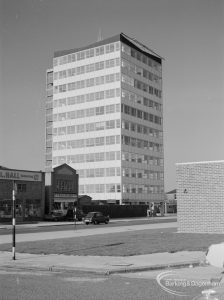Exterior of Asta House, High Road, Chadwell Heath, with lawn in foreground and section of Annie Prendergast Clinic, Ashton Gardens at right, 1967