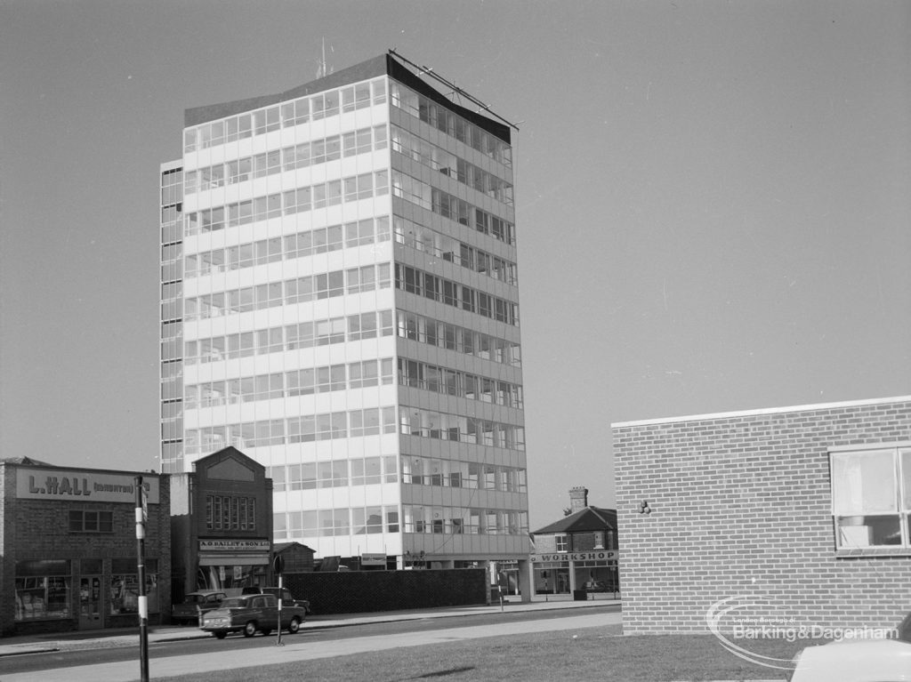 Exterior of Asta House, High Road, Chadwell Heath, with lawn in foreground and section of Annie Prendergast Clinic, Ashton Gardens at right, 1967