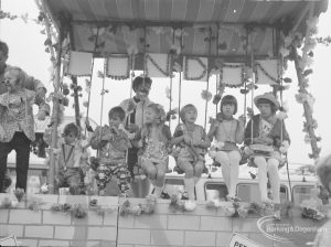 Barking Carnival 1967, showing group of children on ‘London’ float, sitting above wall, 1967