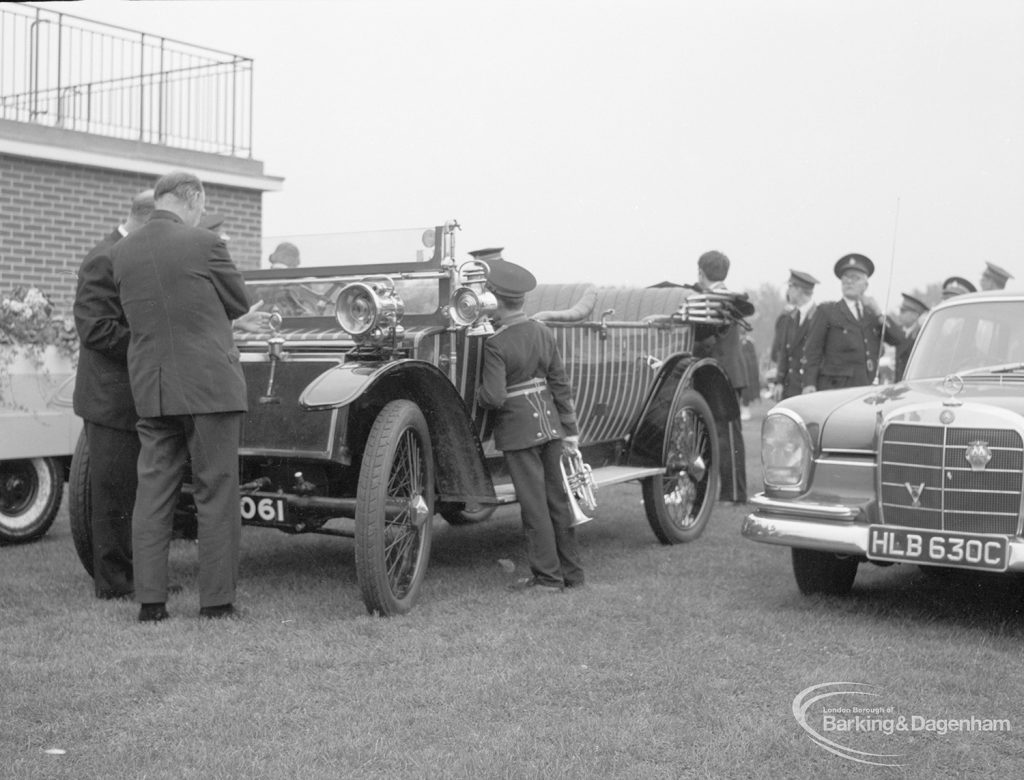 Barking Carnival 1967, showing Boys Brigade bugler and others looking at veteran car, 1967