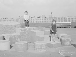 London Borough of Barking Works Department children’s playground in Oval Road North, Dagenham, showing boy and girl on stepping stones, 1967