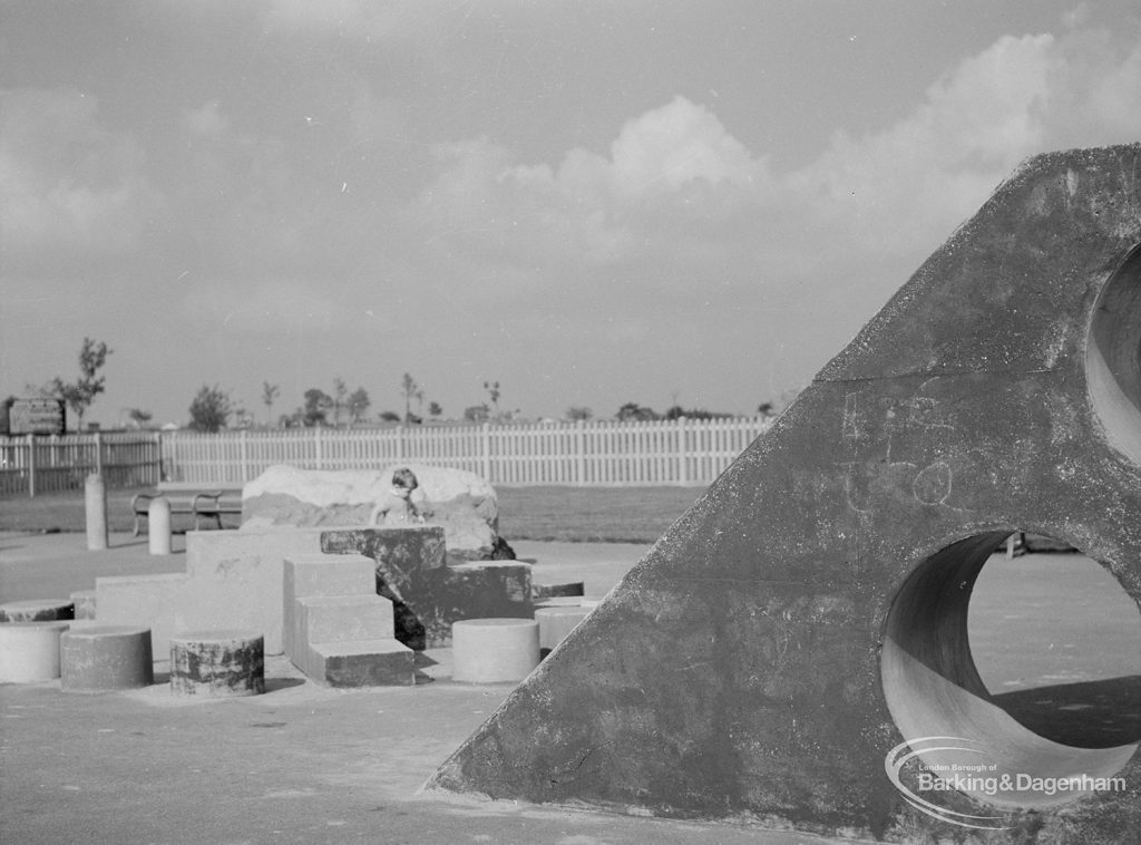 London Borough of Barking Works Department children’s playground in Oval Road North, Dagenham, showing series of stepping stones and corner of truncated pyramidal climbing equipment, 1967