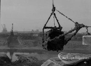 Sewage Works Reconstruction (Riverside Treatment Works) XX, showing dredging buckets at Barking Creek outfall, 1967