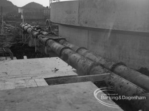 Sewage Works Reconstruction (Riverside Treatment Works) [French’s Contract at Rainham] XX, showing run of pipes supported on stilts, 1967