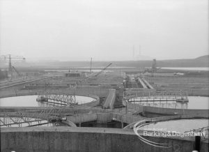Sewage Works Reconstruction (Riverside Treatment Works) XX, showing  tanks, outflow pipes and clearance from south-west [adjoining EES12592 and EES12594], 1967