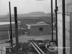 Sewage Works Reconstruction (Riverside Treatment Works) XX, showing view looking through scaffolding to works from south, 1967