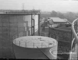 Sewage Works Reconstruction (Riverside Treatment Works) XX, showing three circular constructions (one old) of various heights and sizes, 1967
