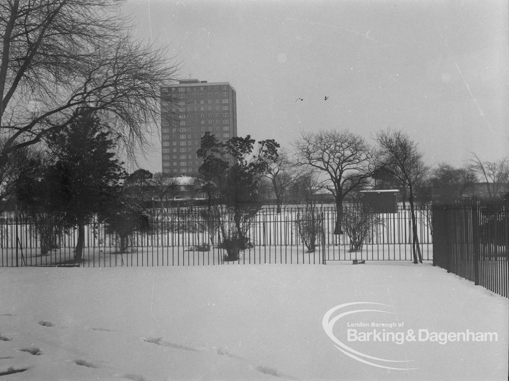 Old Dagenham Village under snow, showing Thaxted House seen across park from Rectory Library, 1968