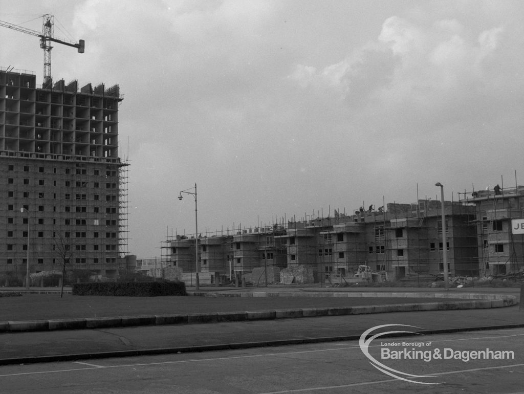 Housing development under construction at Becontree Heath, showing housing on north approach across roundabout in Stour Road area, including part of twin block of flats, 1968