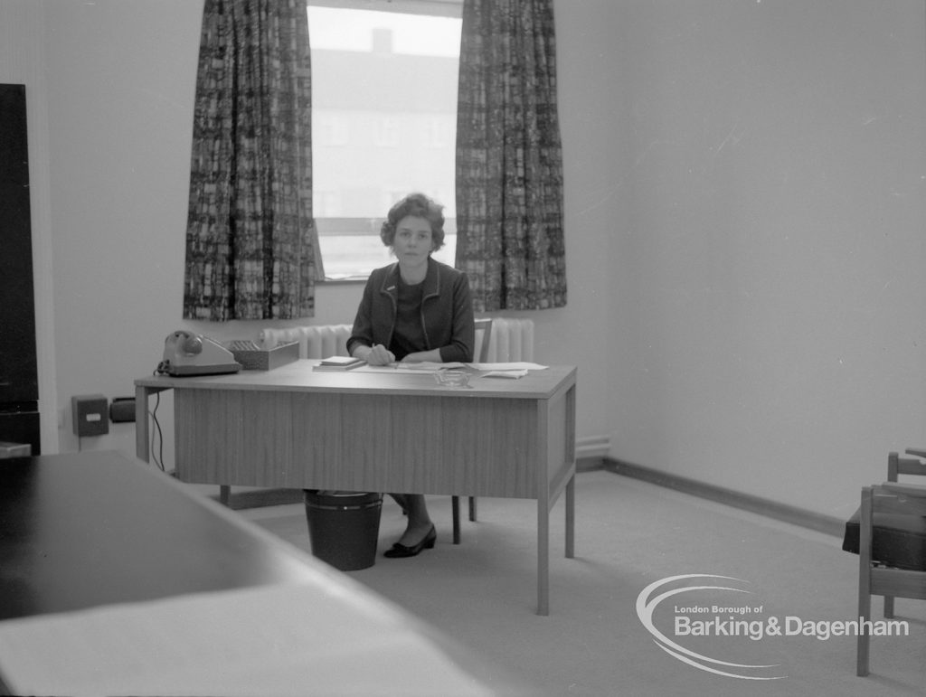 New Riverside Old People’s Home for Senior Citizens, Thames View, showing warden seated in office, 1968