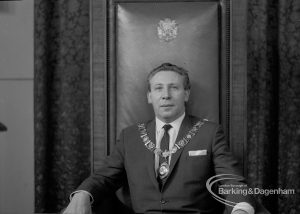 Mayor Councillor William Noyce JP with chain of office sitting in Mayor’s chair, 1968