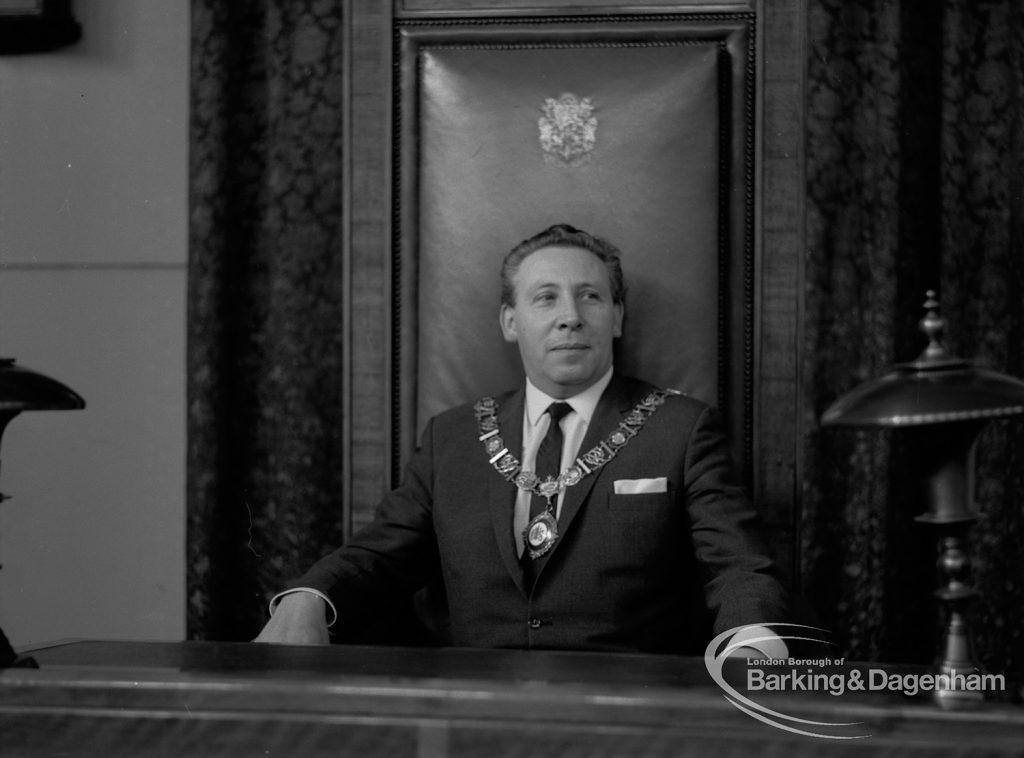 Mayor Councillor William Noyce JP with chain of office sitting in Mayor’s chair, 1968