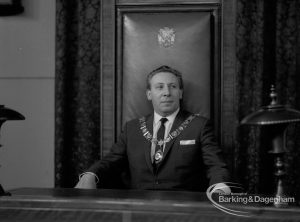 Mayor Councillor William Noyce JP with chain of office sitting in Mayor’s chair, 1968