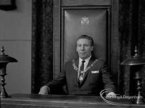 Mayor Councillor William Noyce JP with chain of office sitting in Mayor’s chair, 1968