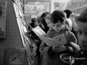 Barking Libraries Children’s Book Week [18th to 27th March] at Valence House, Dagenham, showing child looking at ‘Pierre Lapin’  [‘The Tale of Peter Rabbit’], 1968