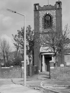 Street lighting, showing new models in front of St Peter and St Paul’s Parish Church in Church Lane, Dagenham, 1968