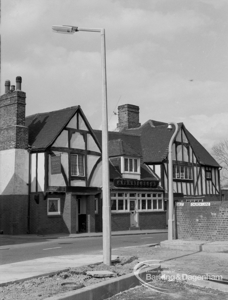 Street lighting, showing new models in front of the Chequers Public House,  Dagenham, 1968