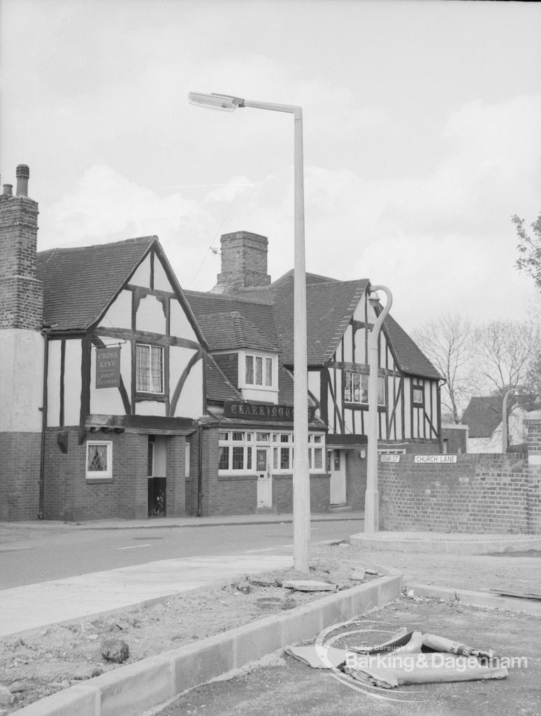 Street lighting, showing new models in front of the Chequers Public House,  Dagenham, 1968