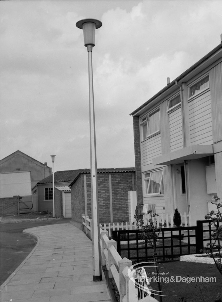 Street lighting, showing single column outside old cottages in Church Lane, Dagenham, 1968