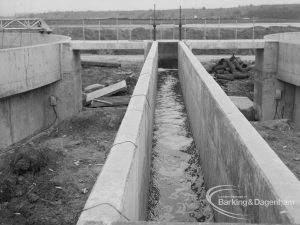 Sewage Works Reconstruction (Riverside Treatment Works) [French’s sector] XXI, showing narrow open culvert, elevated and looking south, 1968