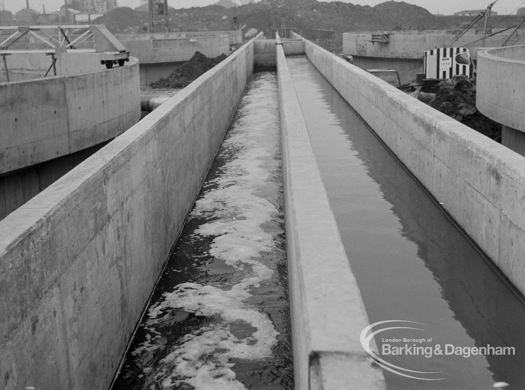 Sewage Works Reconstruction (Riverside Treatment Works) [French’s sector] XXI, showing double open trough between digesters, looking south, 1968