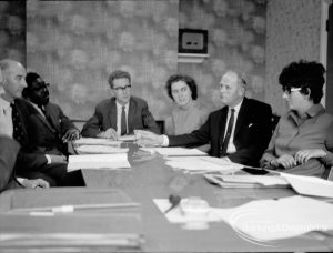 Child Welfare at Woodstock Hall, Gubbins Lane, Harold Wood, showing psychiatrists, headmaster and welfare officers discussing case, 1968