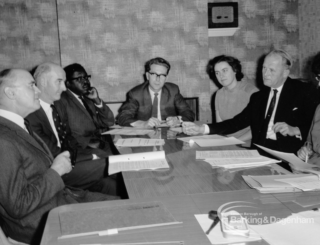 Child Welfare at Woodstock Hall, Gubbins Lane, Harold Wood, showing psychiatrists, headmaster and welfare officers discussing case, 1968