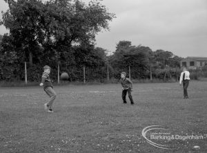 Child Welfare at Woodstock Hall House, Harold Wood, showing boys playing football with ball between players, 1968